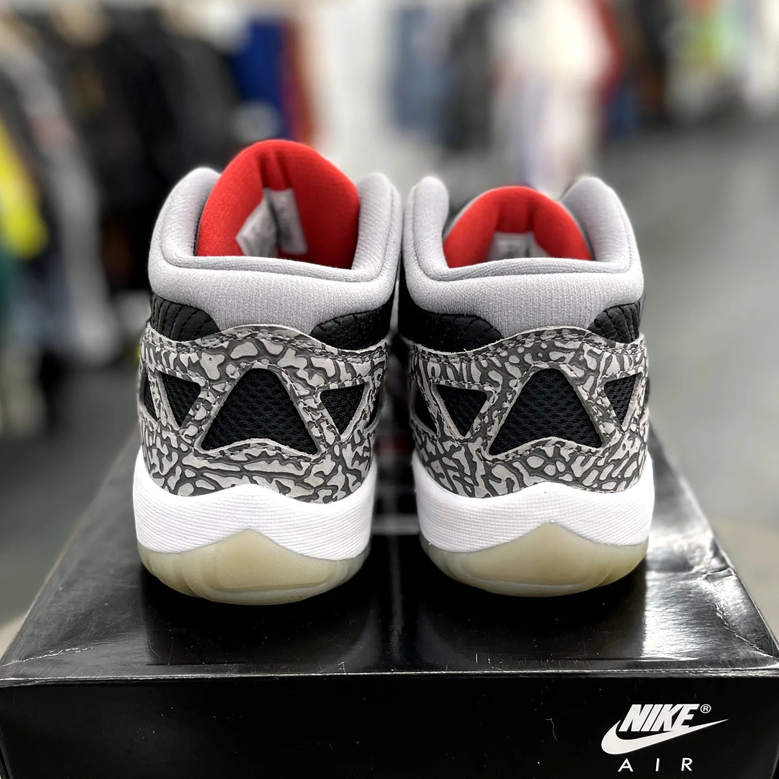 Jordan 11 Retro Low IE Black Cement - Preowned