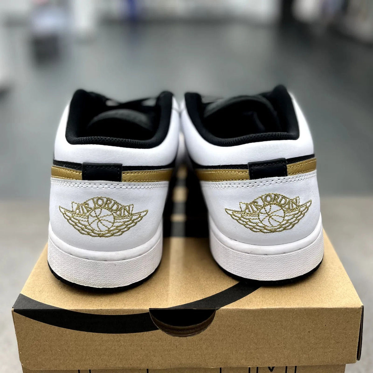 Jordan 1 Low White Black Metallic Gold Swoosh - Preowned