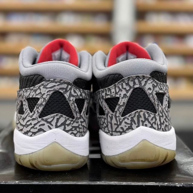 Jordan 11 Retro Low IE Black Cement - Preowned