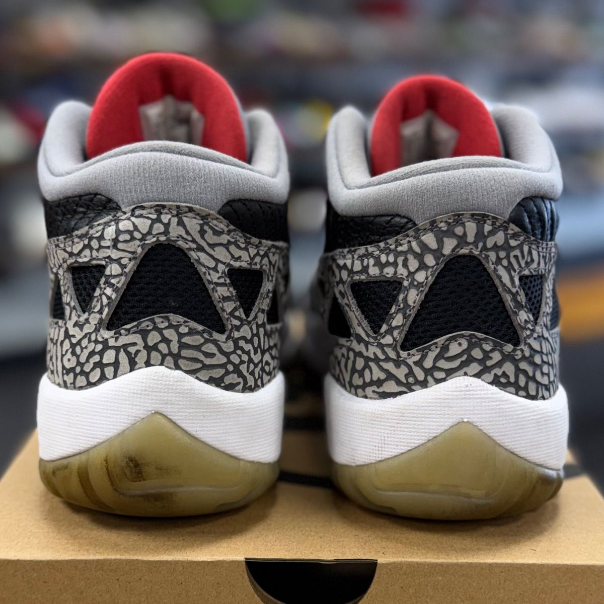 Jordan 11 Retro Low IE Black Cement - Preowned