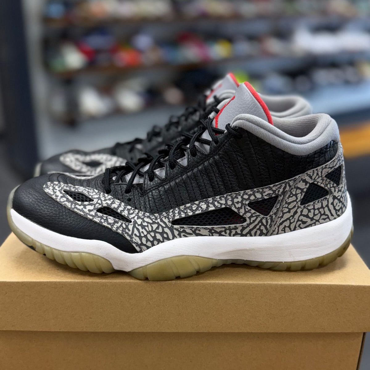 Jordan 11 Retro Low IE Black Cement - Preowned