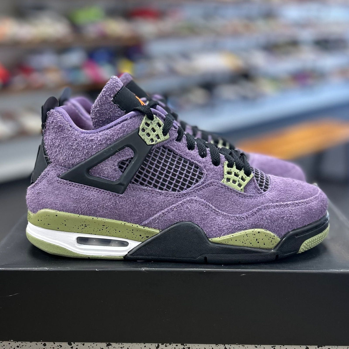 Jordan 4 Retro Canyon Purple (Women's) - Preowned