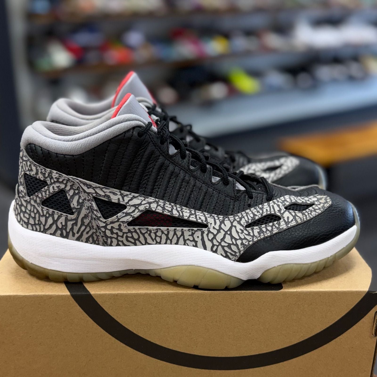 Jordan 11 Retro Low IE Black Cement - Preowned